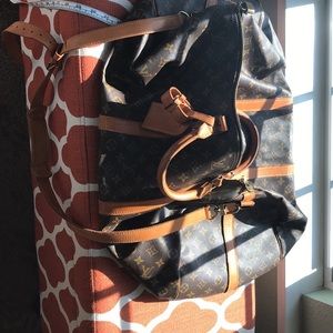 Louis Vuitton weekender satchel